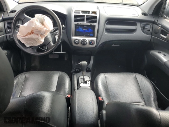 2005 Kia Sportage LX with VIN KNDJE723457117231, listed as a Copart auction lot 50163165 with 97,273 mi miles and Salvage Title. Bid and sale history available at carsss.com. Image 8.