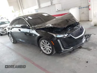 2021 Cadillac CT5 Luxury with VIN 1G6DM5RK9M0146087, listed as a IAAI auction lot 42567880 with 51,776 mi miles and . Bid and sale history available at DreamBid. Image 1.