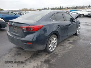 2017 Mazda 3 Touring with VIN 3MZBN1V72HM103660, listed as a IAAI auction lot 41588084 with 95,184 mi miles and . Bid and sale history available at DreamBid. Image 4.