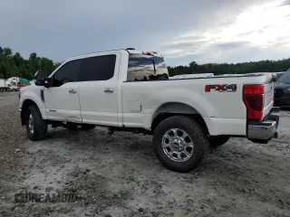 2021 Ford F-250 XL with VIN 1FT8W2BTXMEC41464, listed as a Copart auction lot 61588905 with 131,973 mi miles and Salvage title. Bid and sale history available at DreamBid. Image 2.