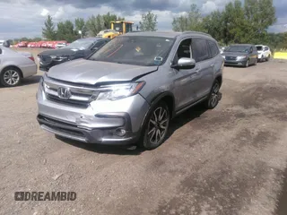2022 Honda Pilot Touring 7-Passenger with VIN 5FNYF6H60NB013465, listed as a IAAI auction lot 40139627 with 78,161 mi miles. Bid and sale history available at carsss.com. Image 22.