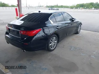 2015 Infiniti Q50 Premium with VIN JN1BV7AR1FM390739, listed as a IAAI auction lot 41865581 with 172,326 mi miles and . Bid and sale history available at DreamBid. Image 4.