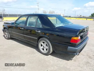1987 Mercedes-Benz 300 with VIN WDBEA30D8HA397811, listed as a IAAI auction lot 41868336 with 124,720 mi miles. Bid and sale history available at carsss.com. Image 3.