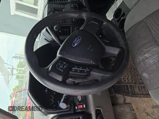 2017 Ford F-150 XL with VIN 1FTEX1E82HKD27618, listed as a IAAI auction lot 42796140 with 124,457 mi miles and . Bid and sale history available at DreamBid. Image 28.
