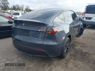 2023 Tesla Model Y Long Range with VIN 7SAYGDEE4PA028440, listed as a IAAI auction lot 41488136 with 29,229 mi miles and . Bid and sale history available at DreamBid. Image 4.