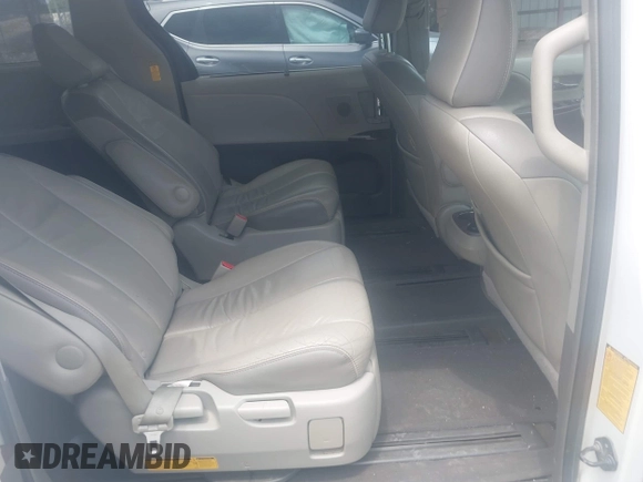 2014 Toyota Sienna XLE with VIN 5TDYK3DC2ES517663, listed as a IAAI auction lot 42171862 with 143,447 mi miles and . Bid and sale history available at DreamBid. Image 8.