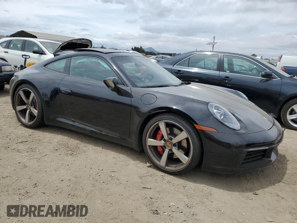 2024 Porsche 911 Carrera S with VIN WP0AB2A92RS218949, listed as a Copart auction lot 57306844 with 1,296 mi miles and Salvage Title. Bid and sale history available at carsss.com. Image 4.