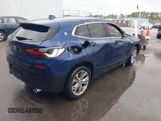 2019 BMW X2 sDrive28i with VIN WBXYJ3C52K5N10612, listed as a IAAI auction lot 41937104 with 107,283 mi miles. Bid and sale history available at carsss.com. Image 4.