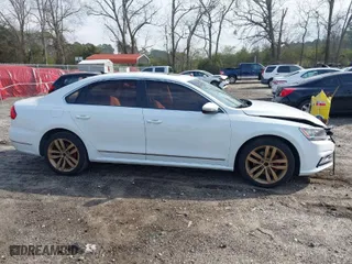 2016 Volkswagen Passat 1.8T SEL with VIN 1VWCT7A39GC057485, listed as a IAAI auction lot 41797043 with 82,632 mi miles. Bid and sale history available at carsss.com. Image 13.