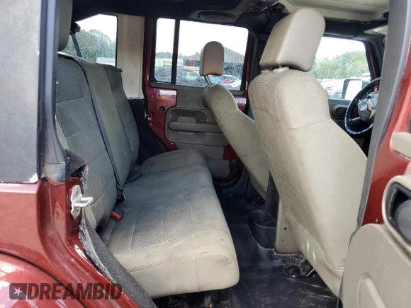 2007 Jeep Wrangler Unlimited Sahara with VIN 1J4GA591X7L118192, listed as a Copart auction lot 62357885 with 261,019 mi miles and Clean title. Bid and sale history available at DreamBid. Image 10.