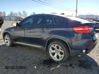 2009 BMW X6 z VIN 5UXFG43539L224989, wystawiony jako Copart lot #87712525 z przebiegiem 124 696 mil mil oraz Tytuł czysty. Historia ofert i sprzedaży dostępna na DreamBid. Obrazek 2.