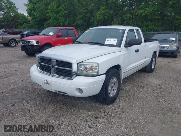 2005 Dodge Dakota SLT with VIN 1D7HW42N75S213191, listed as a IAAI auction lot 42345554 with 152,833 mi miles and . Bid and sale history available at DreamBid. Image 2.