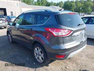 2016 Ford Escape Titanium with VIN 1FMCU9J99GUB27573, listed as a IAAI auction lot 42445457 with 156,784 mi miles and . Bid and sale history available at DreamBid. Image 15.