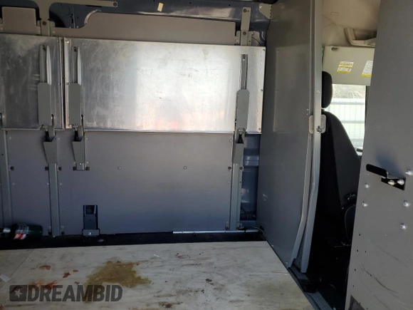 2020 Ford Transit Cargo z VIN 1FTBR3X86LKA48378, wystawiony jako Copart lot #52864655 z przebiegiem 119 031 mil mil oraz Szkoda całkowita • Salvage title. Historia ofert i sprzedaży dostępna na DreamBid. Obrazek 11.
