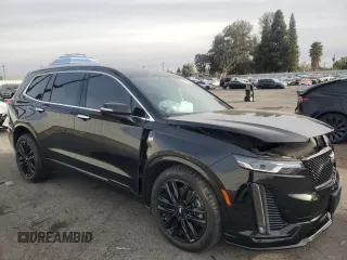 2021 Cadillac XT6 Luxury with VIN 1GYKPAR46MZ235367, listed as a Copart auction lot 84516834 with 73,448 mi miles and Salvage title. Bid and sale history available at DreamBid. Image 4.