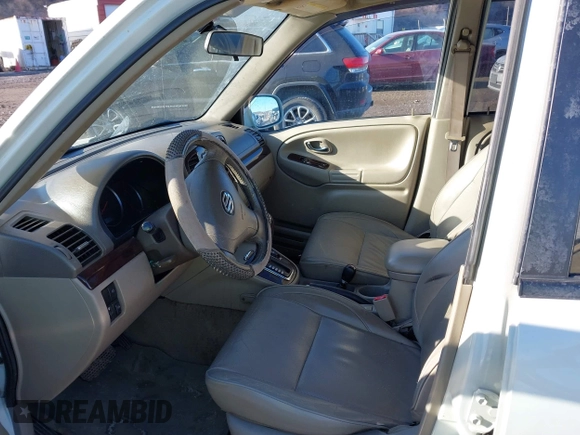 2003 Suzuki XL7 Touring z VIN JS3TX92V734100178, wystawiony jako IAAI lot #41386492 z przebiegiem 91 912 mil mil oraz . Historia ofert i sprzedaży dostępna na DreamBid. Obrazek 5.