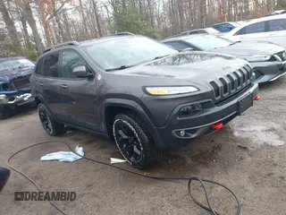 2018 Jeep Cherokee Trailhawk with VIN 1C4PJMBB3JD516090, listed as a IAAI auction lot 41460960 with 97,639 mi miles. Bid and sale history available at carsss.com. Image 1.