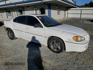 2003 Pontiac Grand Am GT with VIN 1G2NW52E73C208538, listed as a Copart auction lot 80742574 with 250,576 mi miles and Salvage Title. Bid and sale history available at carsss.com. Image 4.
