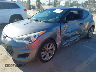 2016 Hyundai Veloster with VIN KMHTC6AD3GU283985, listed as a IAAI auction lot 41872103 with 153,949 mi miles. Bid and sale history available at carsss.com. Image 17.