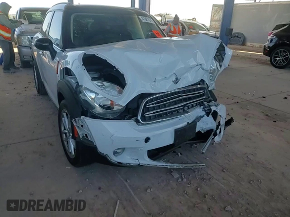 2015 MINI Countryman with VIN WMWZB3C50FWR45253, listed as a Copart auction lot 63608655 with 123,701 mi miles and Salvage title. Bid and sale history available at DreamBid. Image 10.