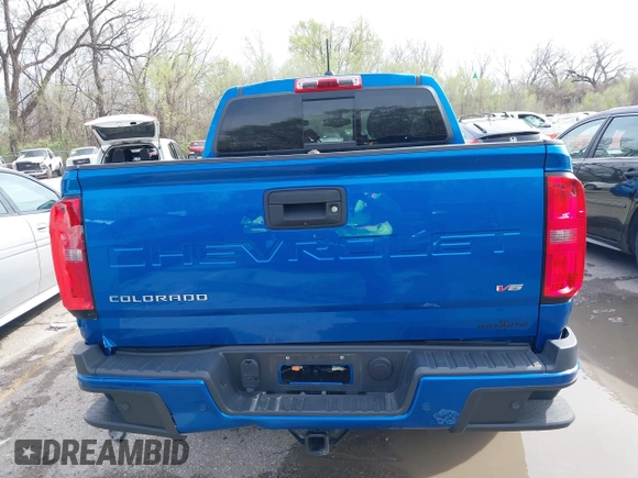 2021 Chevrolet Colorado 4WD Z71 z VIN 1GCGTDEN4M1212479, wystawiony jako IAAI lot #41937713 z przebiegiem 56 164 mil mil oraz . Historia ofert i sprzedaży dostępna na DreamBid. Obrazek 17.