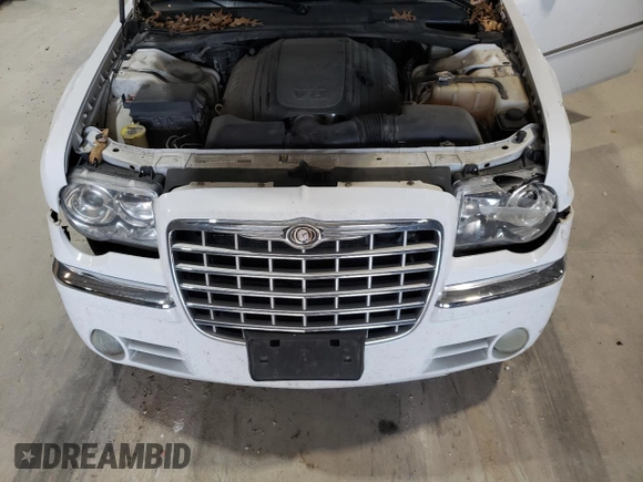 2010 Chrysler 300 with VIN 2C3CA6CT8AH329985, listed as a Copart auction lot 84556624 with 165,348 mi miles and Salvage Title. Bid and sale history available at carsss.com. Image 11.