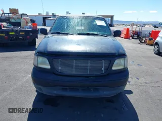 1999 Ford F-150 with VIN 1FTRX17W5XKB46900, listed as a IAAI auction lot 41792177 with Not provided miles and . Bid and sale history available at DreamBid. Image 12.
