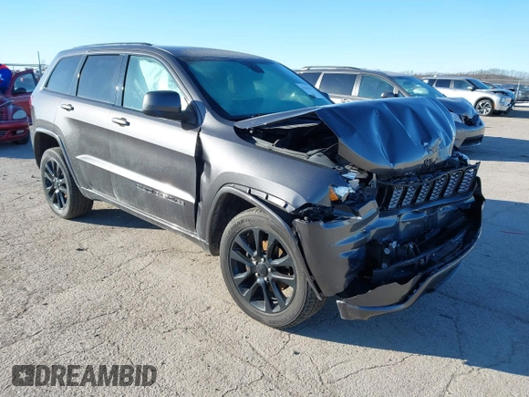 2017 Jeep Grand Cherokee Laredo with VIN 1C4RJFAG7HC769642, listed as a IAAI auction lot 41367874 with 128,095 mi miles. Bid and sale history available at carsss.com. Image 1.