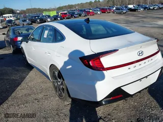 2023 Hyundai Sonata SEL Plus with VIN KMHL44J27PA275714, listed as a IAAI auction lot 41590344 with 64,951 mi miles. Bid and sale history available at carsss.com. Image 3.