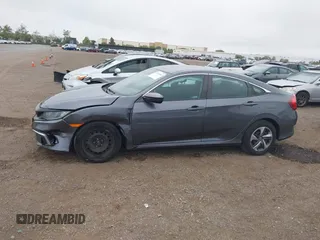 2020 Honda Civic LX with VIN 2HGFC2F63LH567698, listed as a IAAI auction lot 42354886 with 70,977 mi miles and . Bid and sale history available at DreamBid. Image 15.