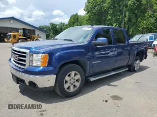 2013 GMC Sierra 1500 SLT with VIN 3GTP2WE77DG161822, listed as a Copart auction lot 63851855 with 169,146 mi miles and Salvage title. Bid and sale history available at DreamBid. Image 1.