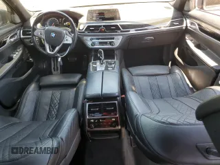 2018 BMW 7 Series 740i with VIN WBA7E2C59JG742809, listed as a Copart auction lot 66995934 with 62,017 mi miles and Salvage Title. Bid and sale history available at carsss.com. Image 8.
