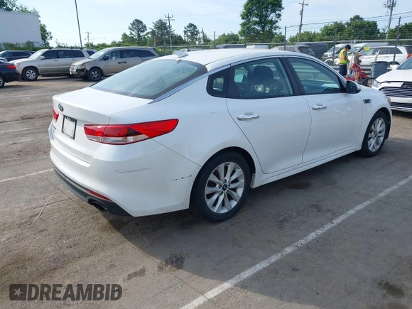 2016 Kia Optima LX with VIN 5XXGT4L34GG061718, listed as a IAAI auction lot 42176256 with 115,572 mi miles and . Bid and sale history available at carsss.com. Image 4.