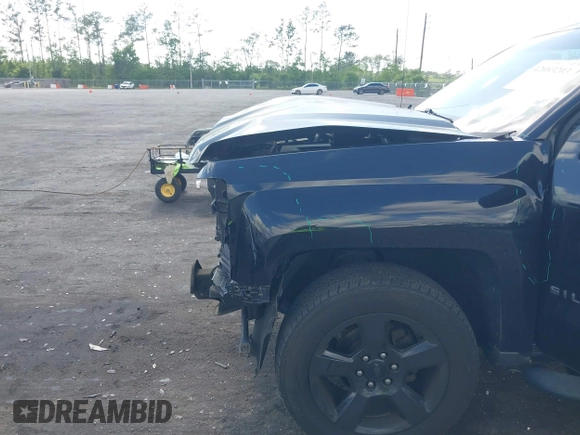 2015 Chevrolet Silverado 1500 LS with VIN 1GCRCPEH4FZ411072, listed as a IAAI auction lot 42083203 with 75,372 mi miles and . Bid and sale history available at DreamBid. Image 6.