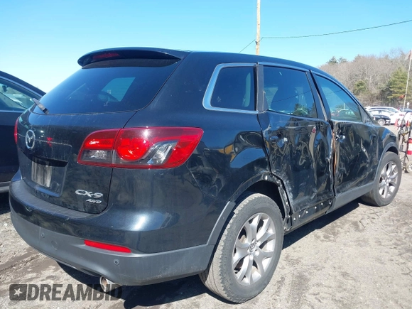 2015 Mazda CX-9 Touring with VIN JM3TB3CV1F0465919, listed as a IAAI auction lot 41704700 with 139,075 mi miles. Bid and sale history available at carsss.com. Image 4.