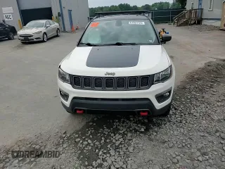 2019 Jeep Compass Trailhawk with VIN 3C4NJDDB5KT671613, listed as a Copart auction lot 61023125 with 64,793 mi miles and Salvage title. Bid and sale history available at DreamBid. Image 14.