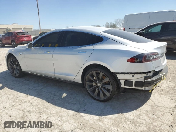2013 Tesla Model S с VIN 5YJSA1CN5DFP05936, выставлен на аукционе Copart как лот 51831795 с пробегом Не указан миль и Списание • Salvage title. История ставок и продаж доступна на DreamBid. Изображение 2.