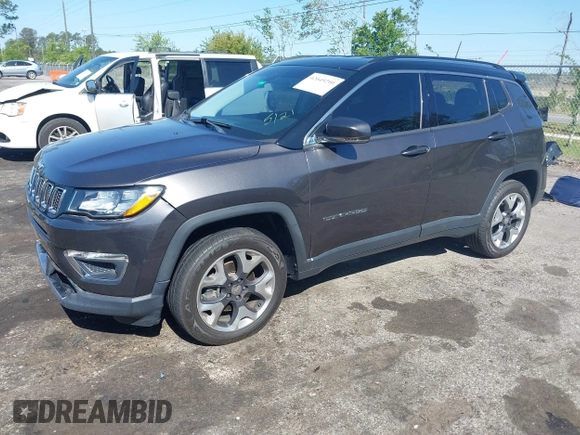2018 Jeep Compass Limited with VIN 3C4NJDCB8JT284845, listed as a IAAI auction lot 42049290 with 59,210 mi miles and . Bid and sale history available at carsss.com. Image 2.