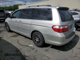 2005 Honda Odyssey Touring z VIN 5FNRL38835B071258, wystawiony jako Copart lot #57878295 z przebiegiem 143 474 mil mil oraz Szkoda całkowita • Salvage title. Historia ofert i sprzedaży dostępna na DreamBid. Obrazek 2.