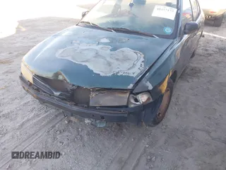 1999 Mitsubishi Mirage DE z VIN JA3AY26A0XU017889, wystawiony jako IAAI lot #40457172 z przebiegiem Nie podano mil oraz . Historia ofert i sprzedaży dostępna na DreamBid. Obrazek 6.