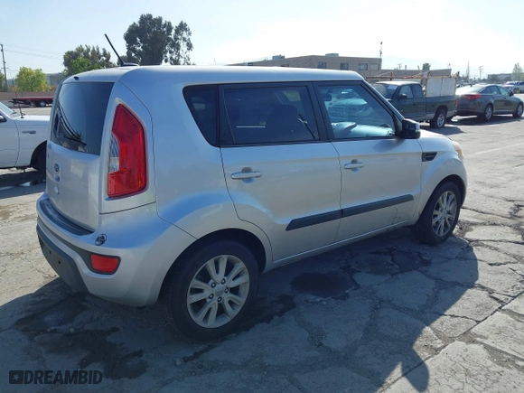 2012 Kia Soul + with VIN KNDJT2A62C7370341, listed as a IAAI auction lot 42102484 with 67,116 mi miles. Bid and sale history available at carsss.com. Image 4.
