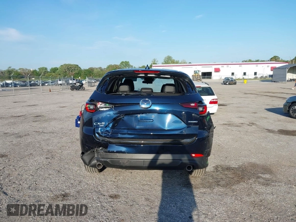 2023 Mazda CX-5 2.5 S Select Package with VIN JM3KFBBM1P0284887, listed as a IAAI auction lot 41910092 with 2,616 mi miles. Bid and sale history available at carsss.com. Image 16.