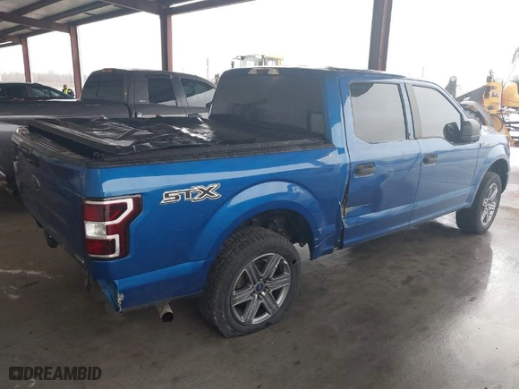 2018 Ford F-150 XL with VIN 1FTEW1CP9JKC79943, listed as a IAAI auction lot 41211868 with 103,035 mi miles. Bid and sale history available at carsss.com. Image 4.