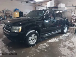 2010 Chevrolet Suburban LT with VIN 1GNUKJE33AR236764, listed as a IAAI auction lot 41447407 with 246,865 mi miles. Bid and sale history available at carsss.com. Image 2.