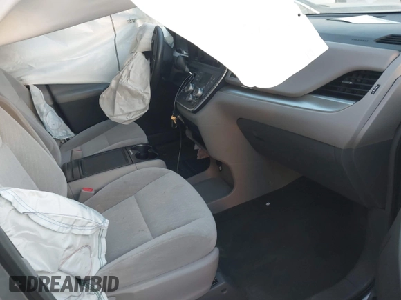 2016 Toyota Sienna LE with VIN 5TDJK3DC4GS133694, listed as a IAAI auction lot 41171171 with 99,680 mi miles. Bid and sale history available at carsss.com. Image 5.