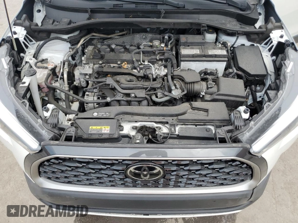 2023 Toyota Corolla Cross XLE z VIN 7MUDAAAG7PV051492, wystawiony jako Copart lot #61185635 z przebiegiem 79 364 mil mil oraz Nie do naprawy • Non repairable. Historia ofert i sprzedaży dostępna na DreamBid. Obrazek 12.