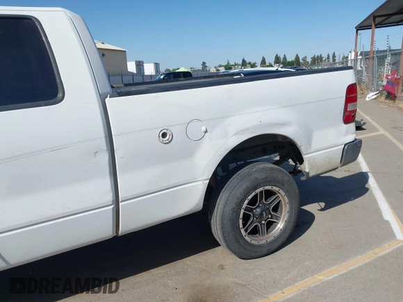 2007 Ford F-150 XLT with VIN 1FTPX14527KD42148, listed as a IAAI auction lot 42077816 with 267,360 mi miles. Bid and sale history available at carsss.com. Image 12.
