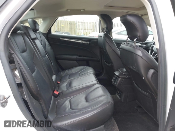 2013 Ford Fusion Titanium Hybrid with VIN 3FA6P0RU5DR357469, listed as a IAAI auction lot 41969315 with 215,732 mi miles. Bid and sale history available at carsss.com. Image 8.