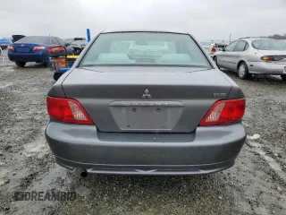 2003 Mitsubishi Galant ES z VIN 4A3AA46G03E180873, wystawiony jako Copart lot #46141195 z przebiegiem 234 709 mil mil oraz Szkoda całkowita • Salvage title. Historia ofert i sprzedaży dostępna na DreamBid. Obrazek 6.