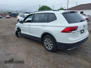 2020 Volkswagen Tiguan S with VIN 3VV0B7AX0LM140910, listed as a IAAI auction lot 42622385 with 80,998 mi miles and . Bid and sale history available at DreamBid. Image 3.